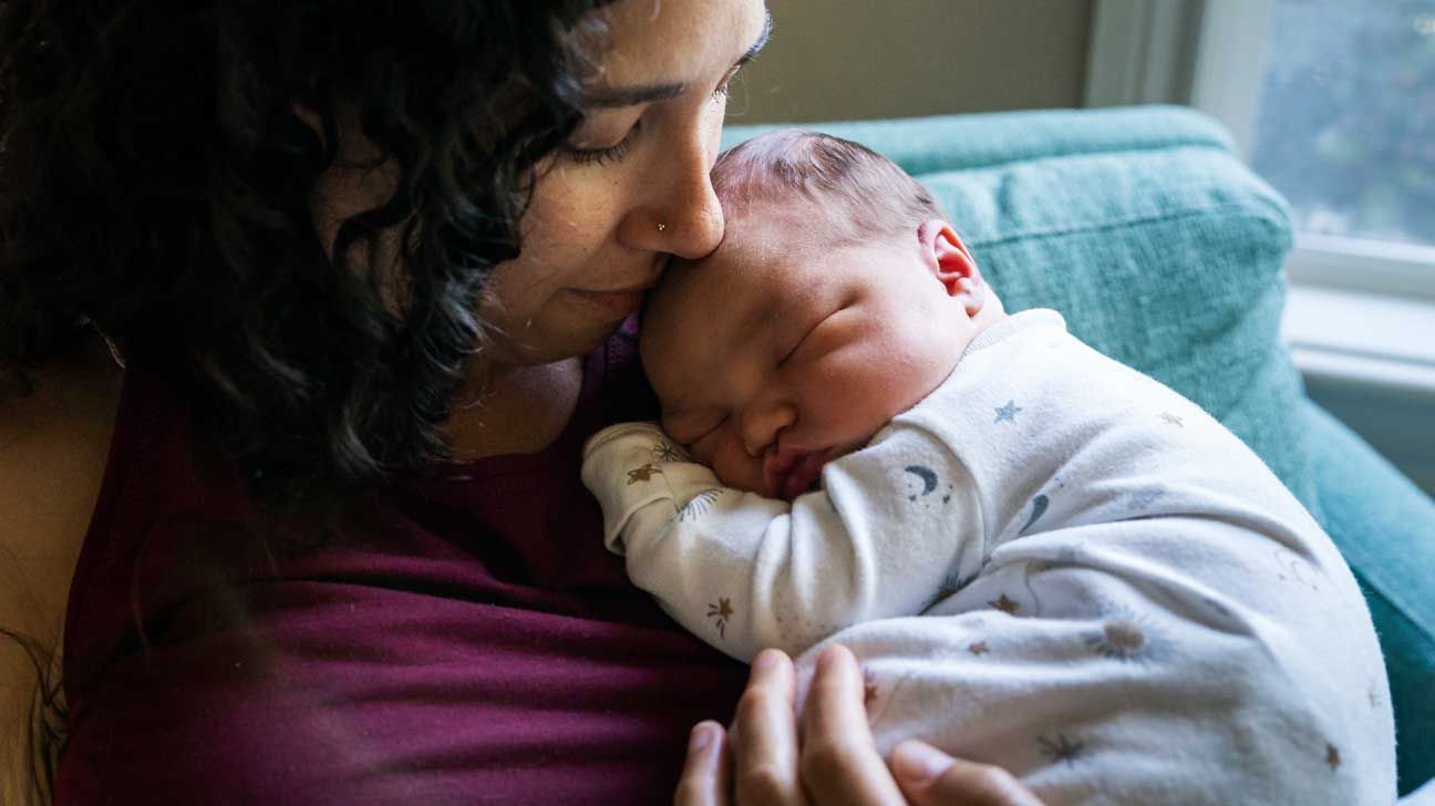 mother holding newborn with periventricular leukomalacia-1