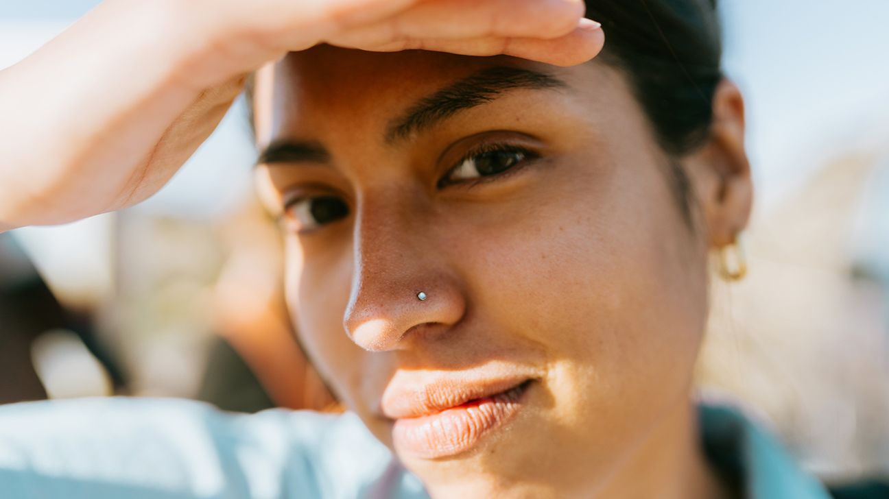 A person with a nose piercing.