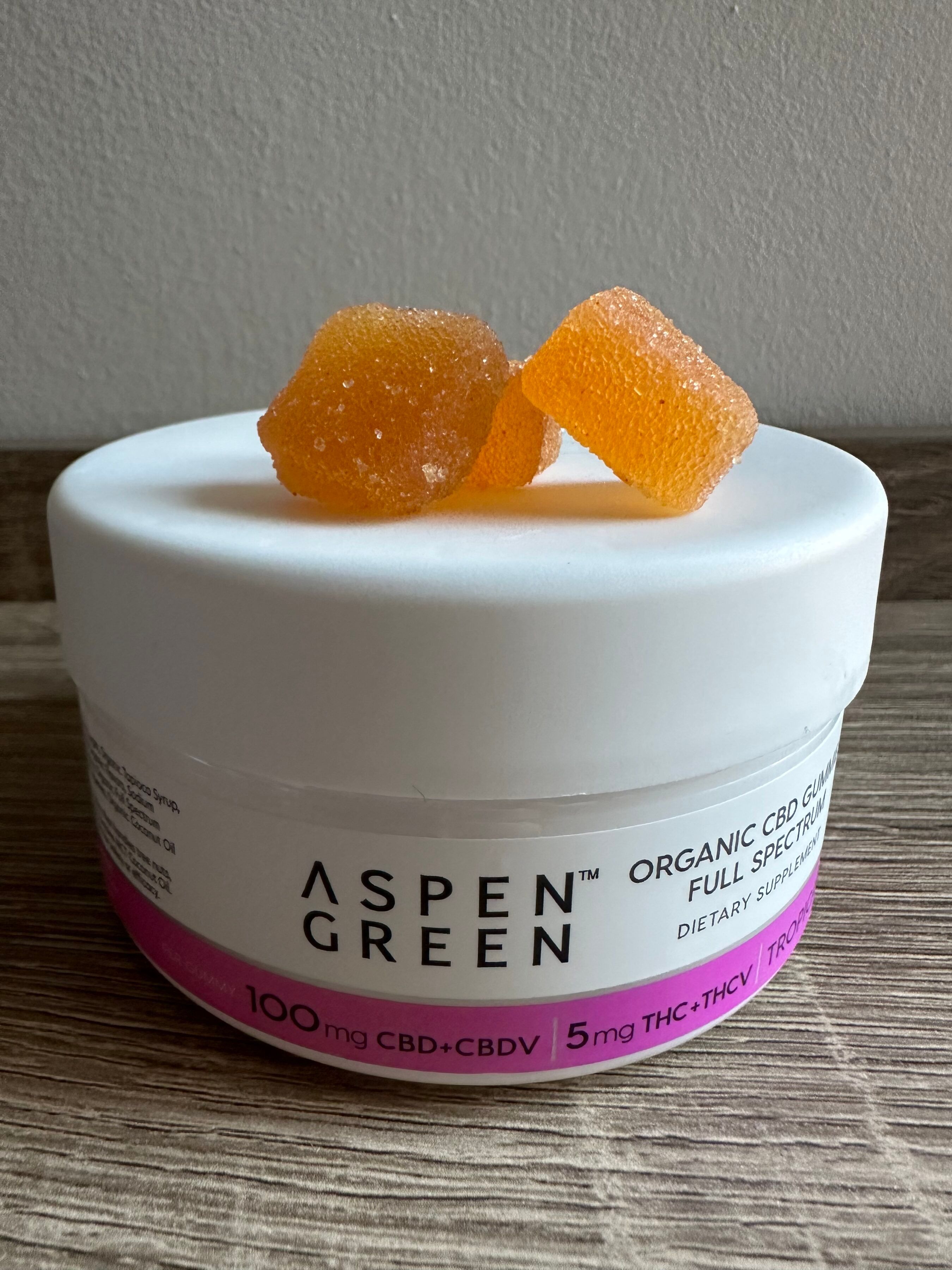 Aspen Green CBD gummies container on counter