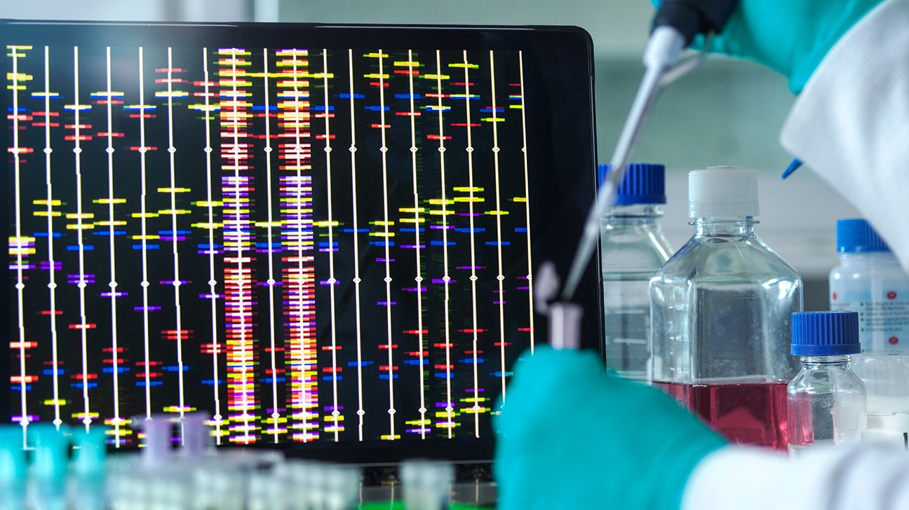 A geneticist mapping someone's chromosomes for Bernard-Soulier syndrome diagnosis. 