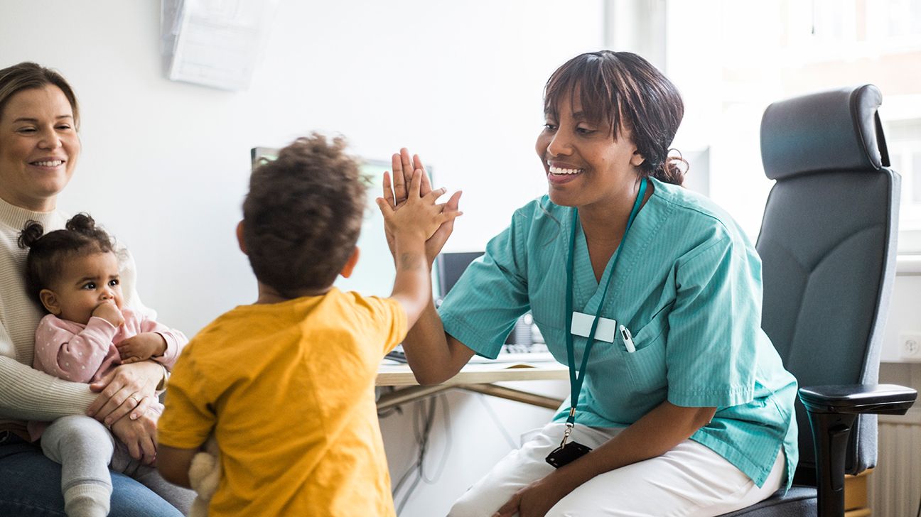 doctor playing with a child with pediatric thalassemia-1