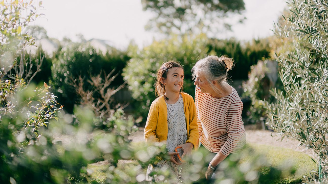 Young girl walking with grandmother.