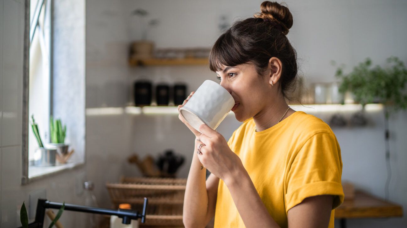 Female drinking a cup of coffee