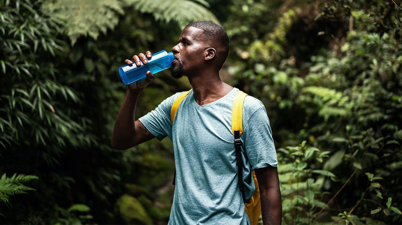 man drinking water