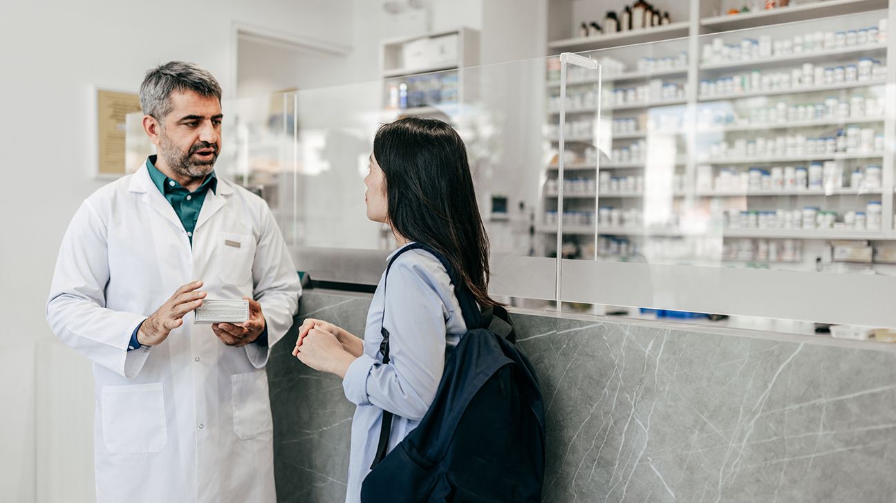 pharmacist talking with patient