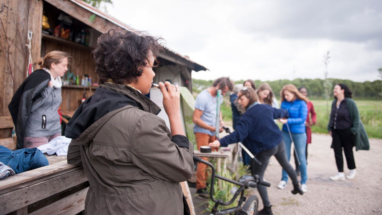 Female vaping outdoors