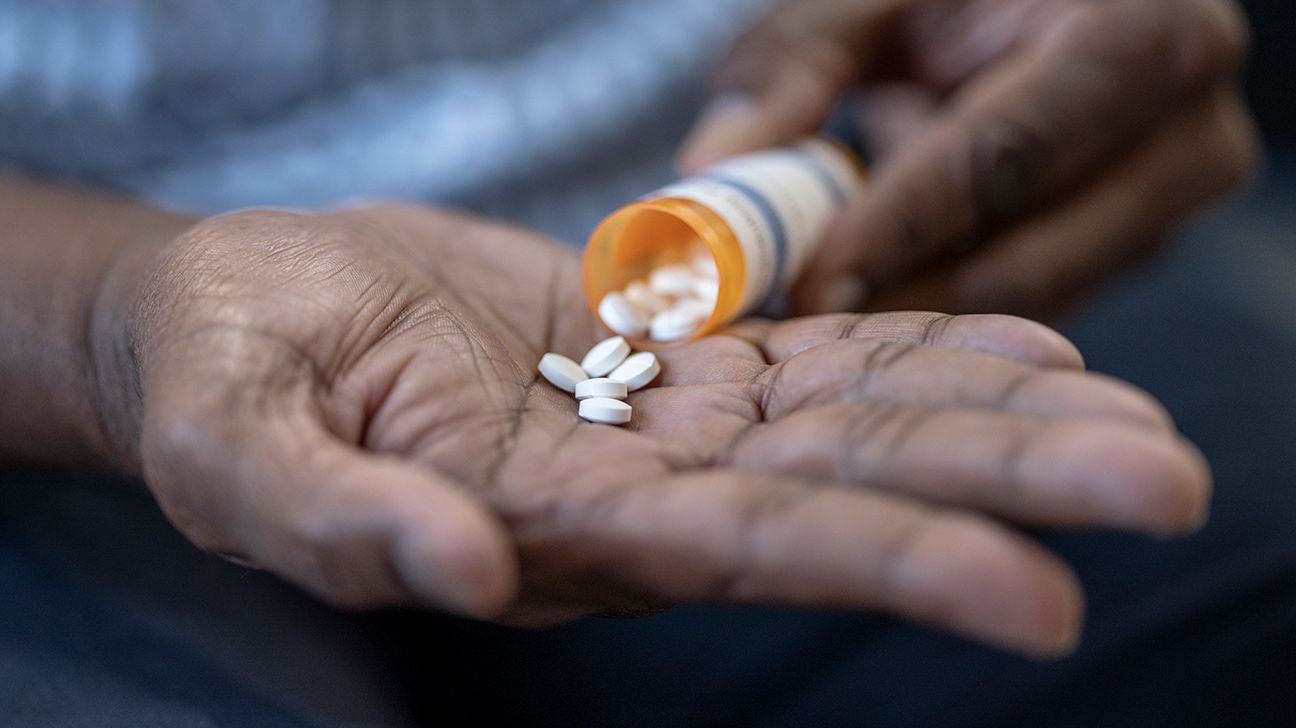 open hand with medication pills