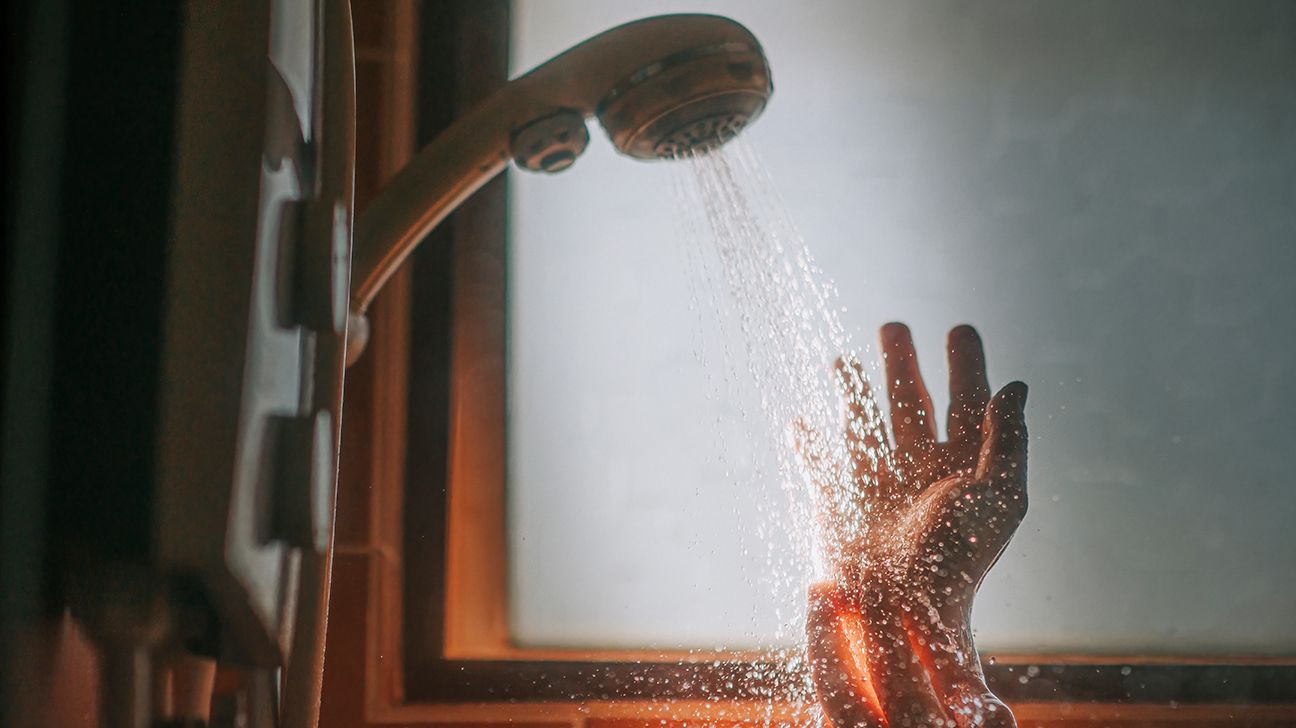 a shower head with running water
