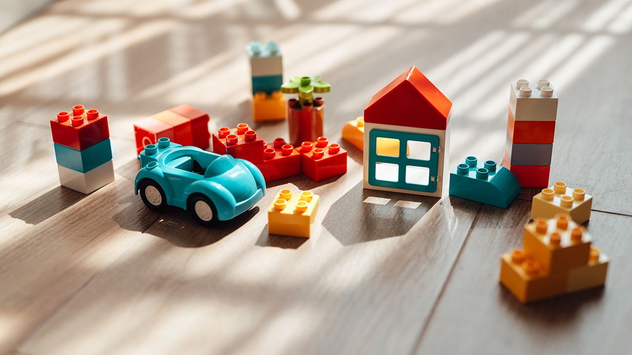multi-colored plastic toys on the floor