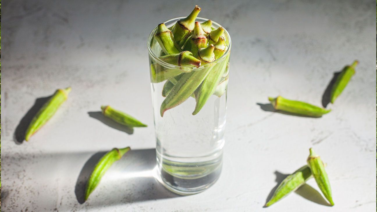 whole okra in water glass