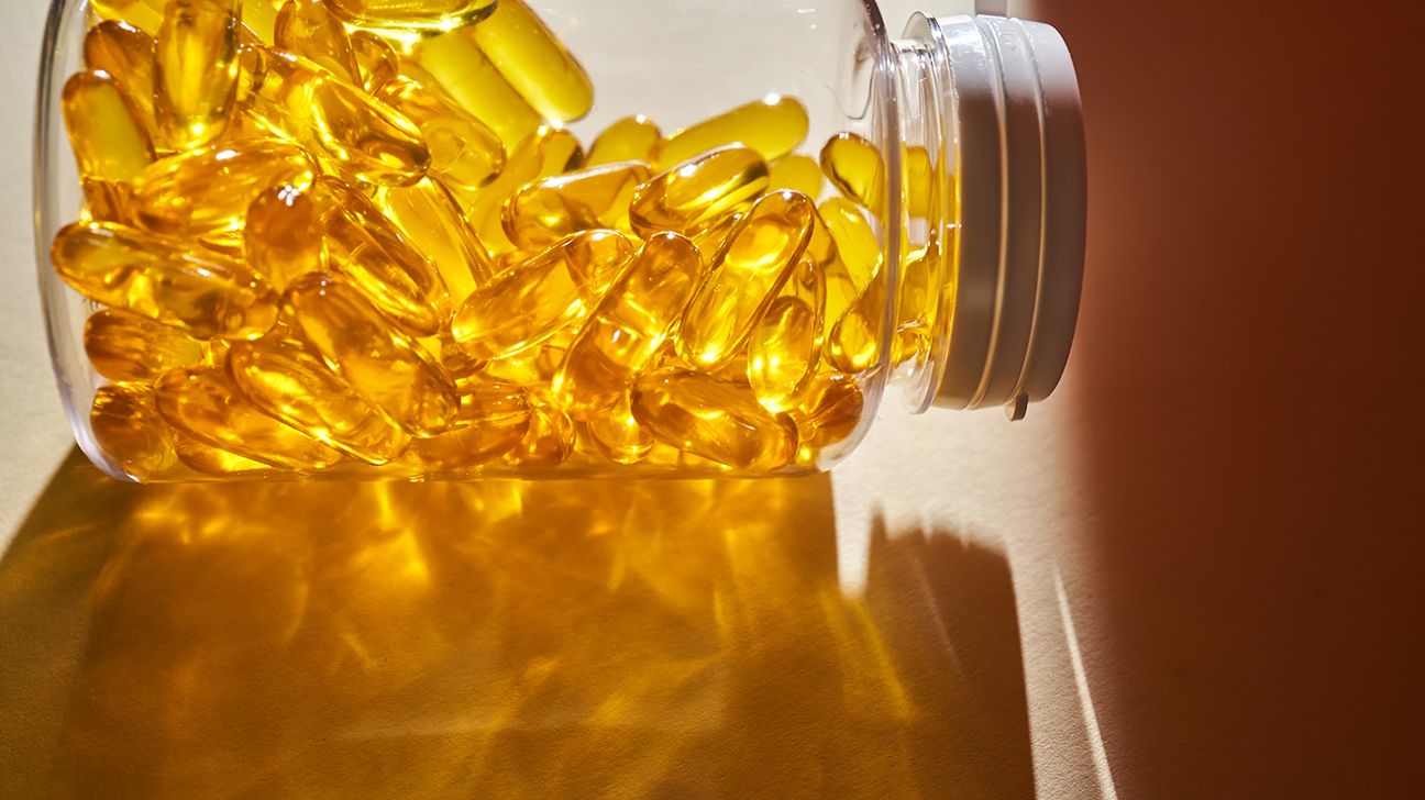 Vitamin D capsules in transparent bottle
