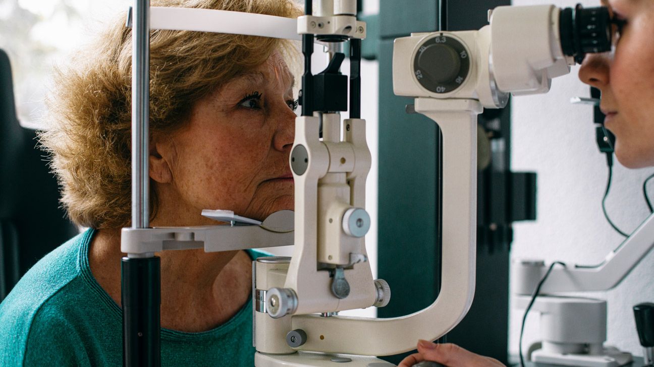 Older female getting eye exam
