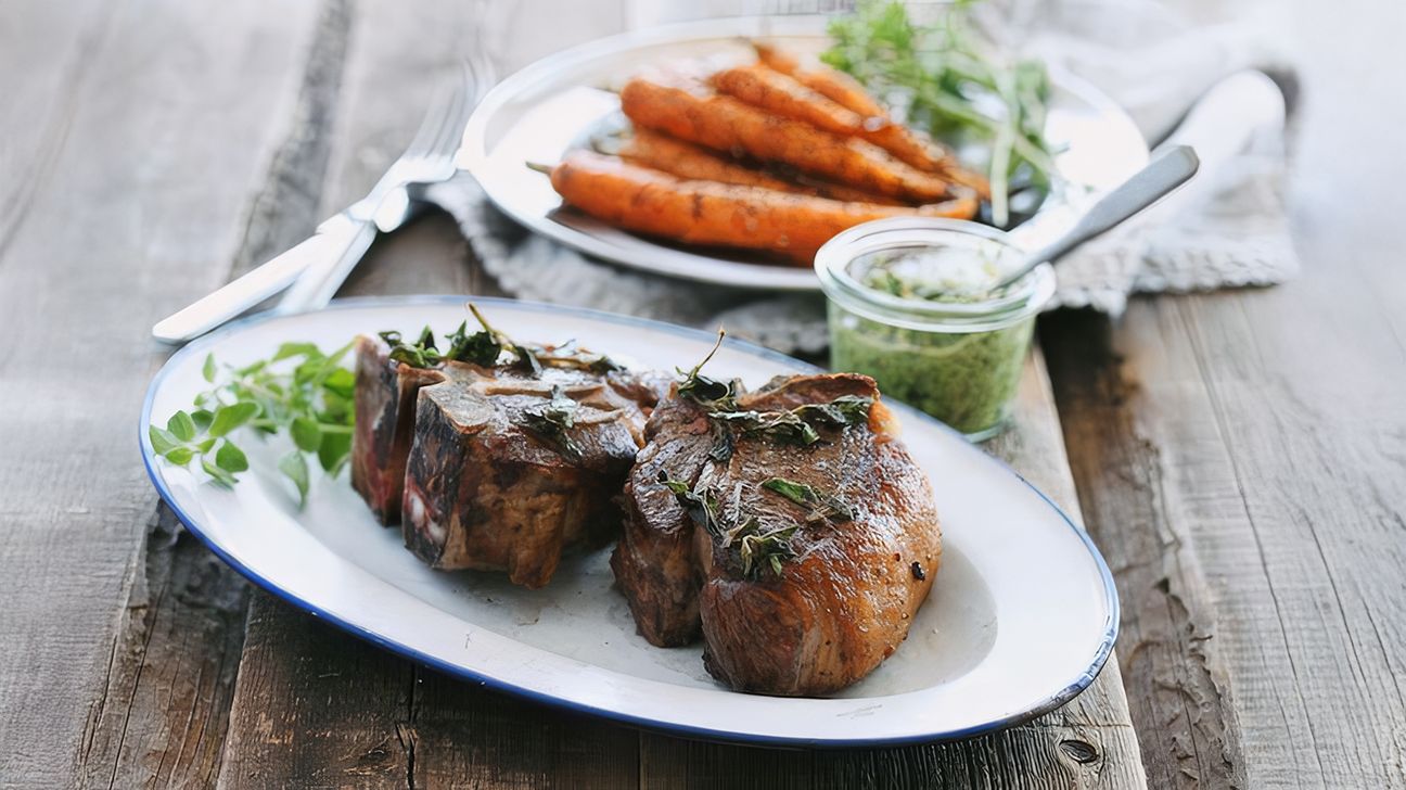 Roasted lamb with mint pesto and spiced carrots & potatoes