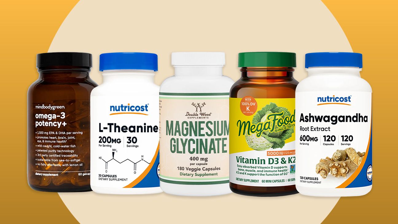 The best supplements for anxiety, according to Healthline. Supplements by mindbodygreen, Nutricost, Double Wood, and MegaFood are displayed in a horizontal line, on a gold background.