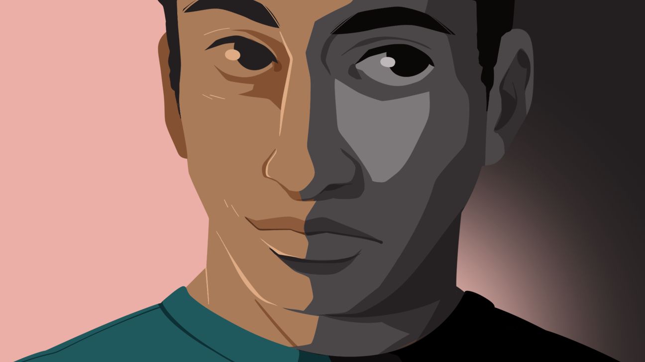 person with half their face in shadow