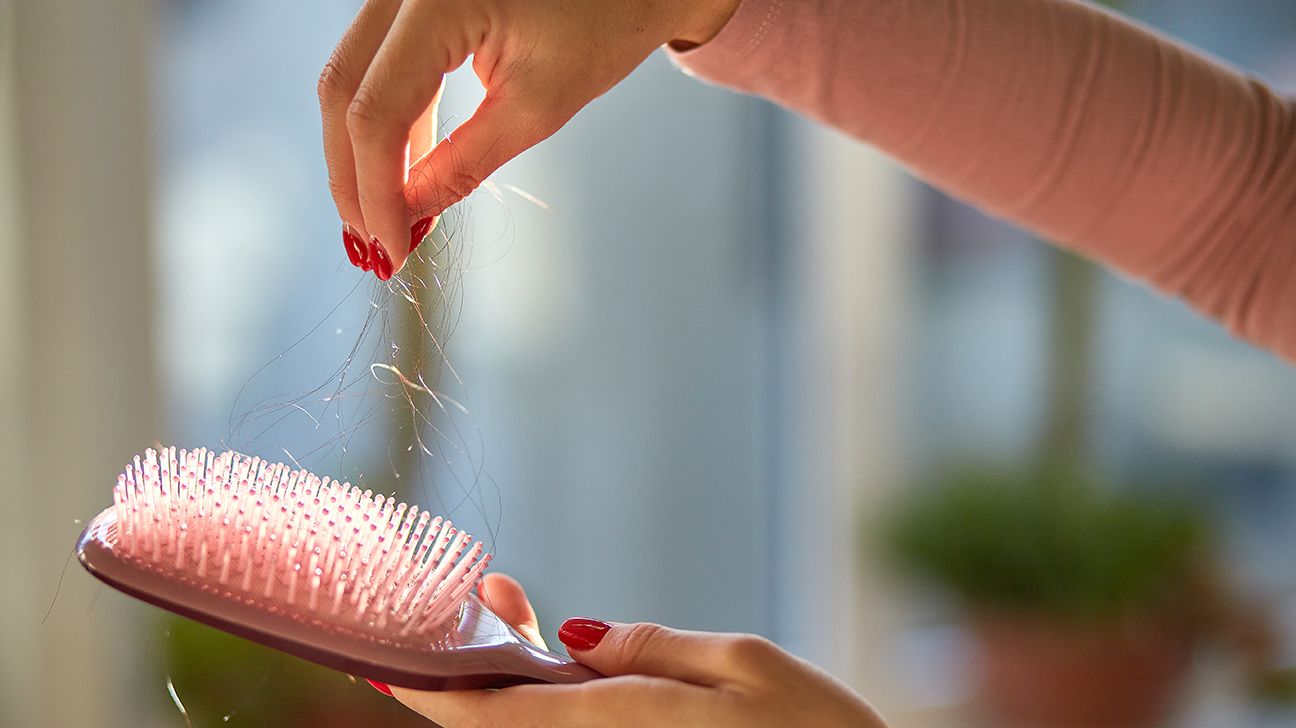 Removing hair from a brush