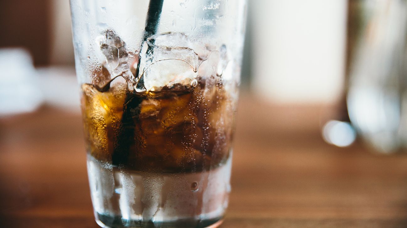 Soda in a glass over ice
