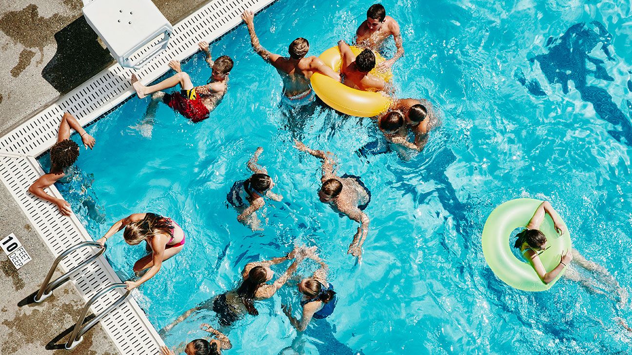Swimming pool full of children