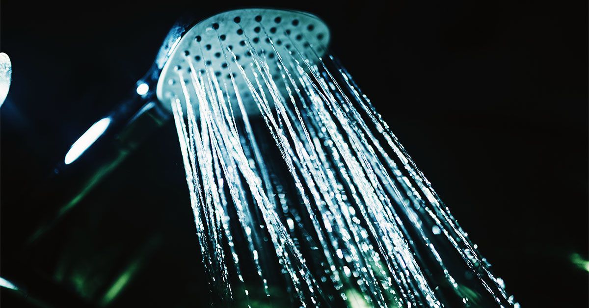 What Is 'Dark Showering' and Can It Really Help You Sleep Better?