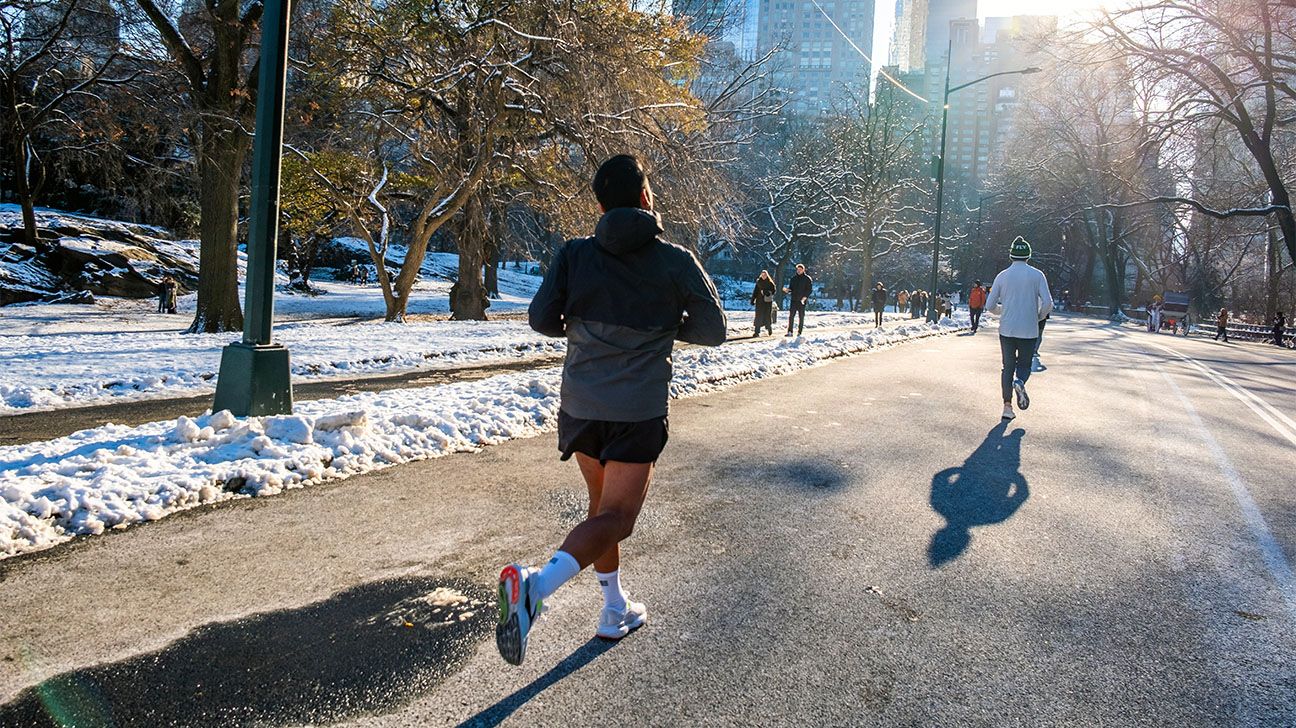 Male jogging outdoors in winter