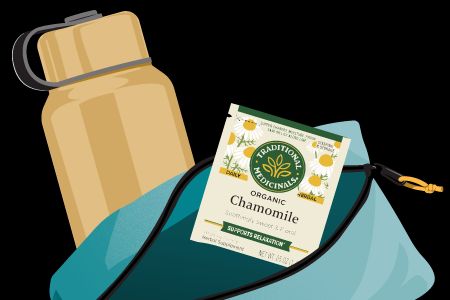 Illustration of a pouch with chamomile tea and a water bottle