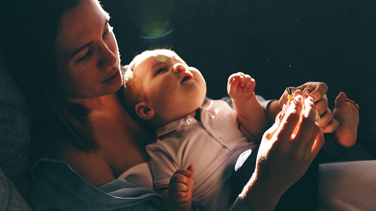 New mother holds an infant