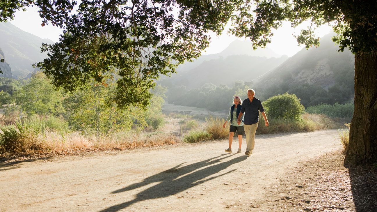 Older couple walking outdoors