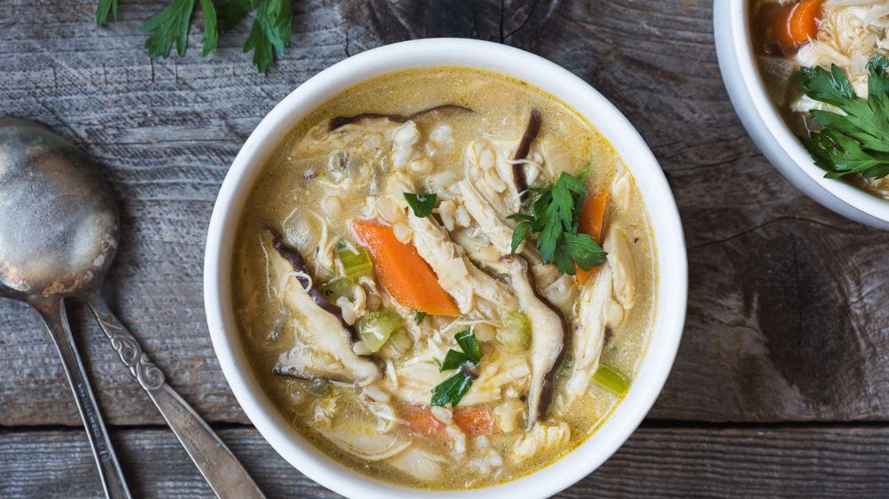 Creamy chicken, shiitake, and recipe soup in a white bowl