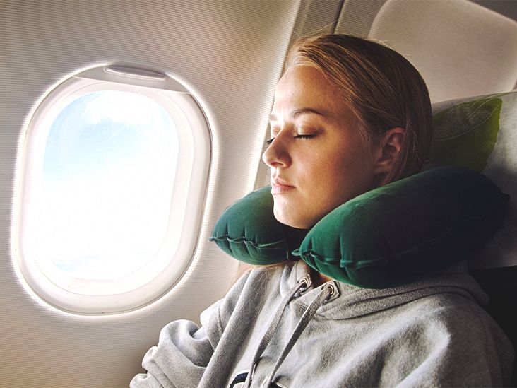 How to Sleep on a Plane: Where to Sit, What to Pack, and Sleep Tips