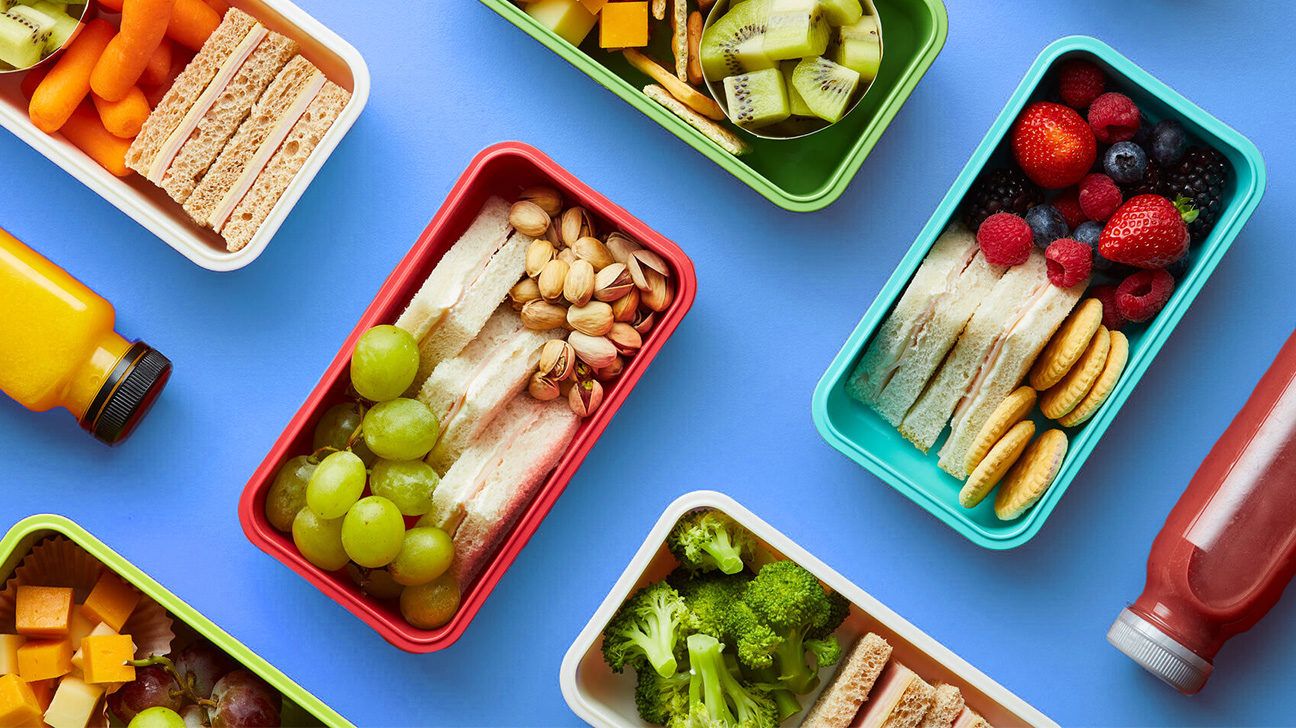 colorful Bento boxes on a blue table