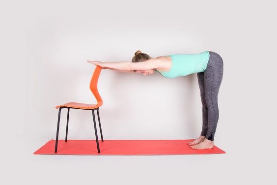 down dog with a chair for beginner's yoga