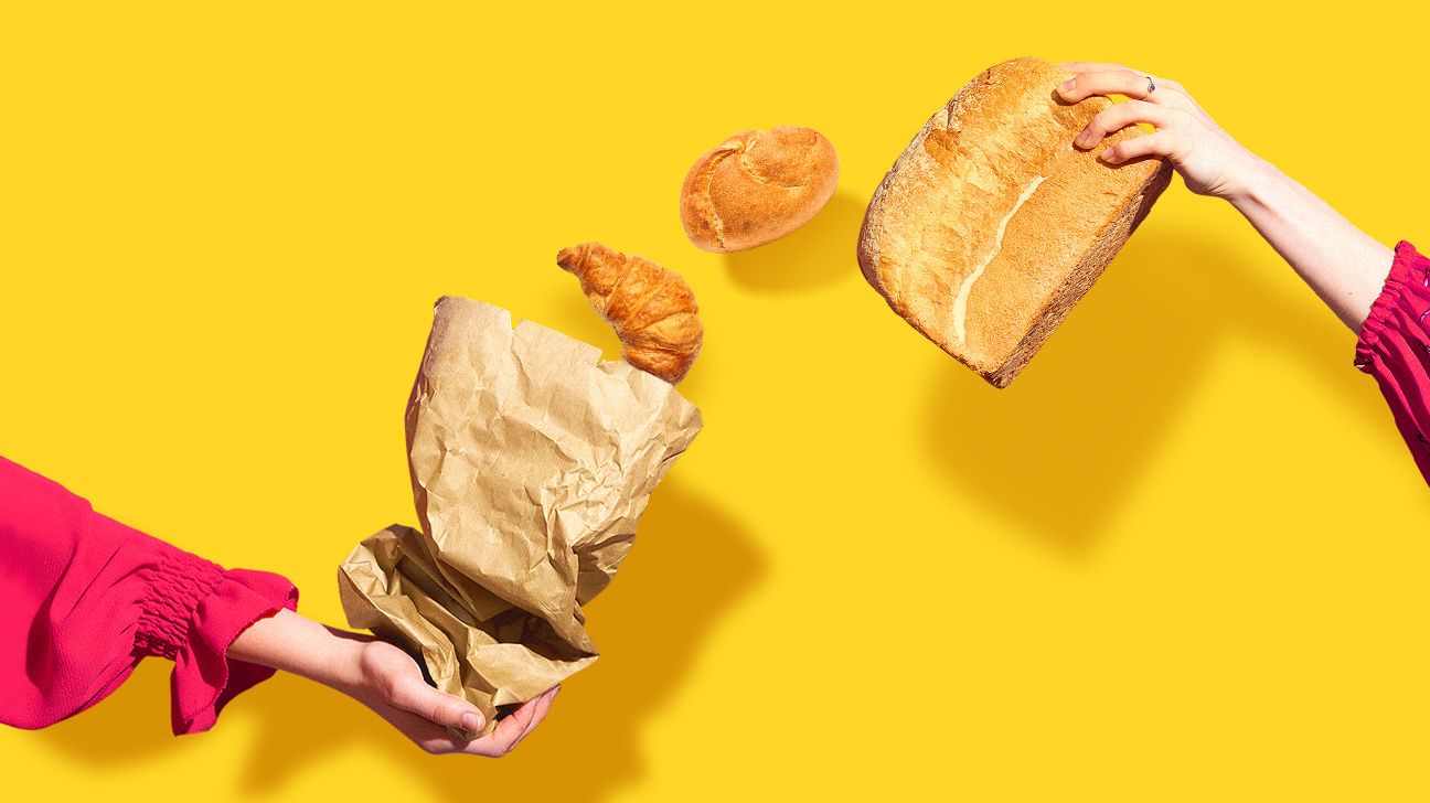 croissant and bread coming out of a bag