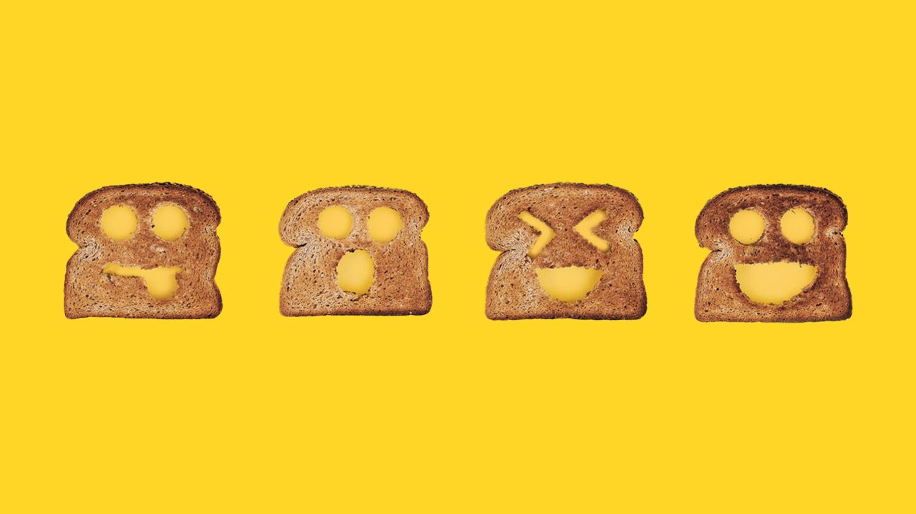 faces cut out of bread