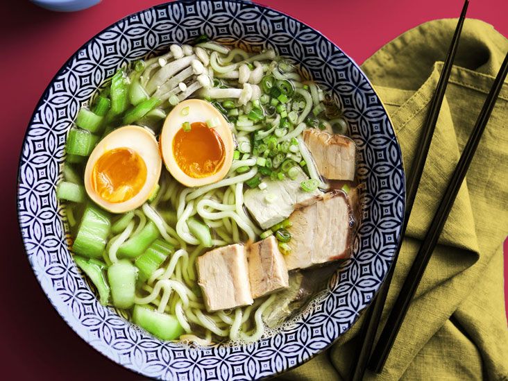 ramen soup with eggs, noodles, and spring onion