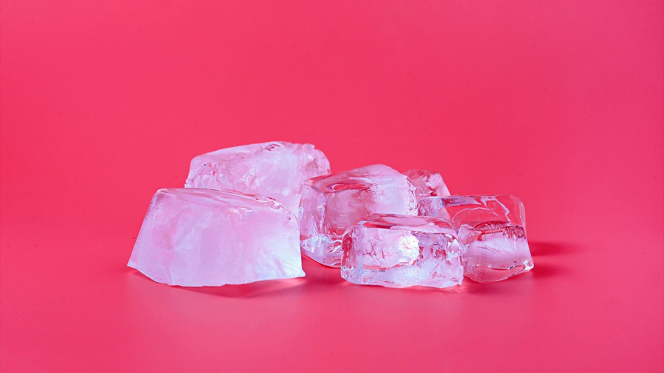 ice cubes on pink background