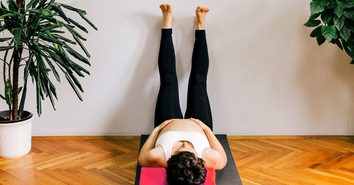 Downward Dog And Other Poses Get The Thumbs-Up During Pregnancy