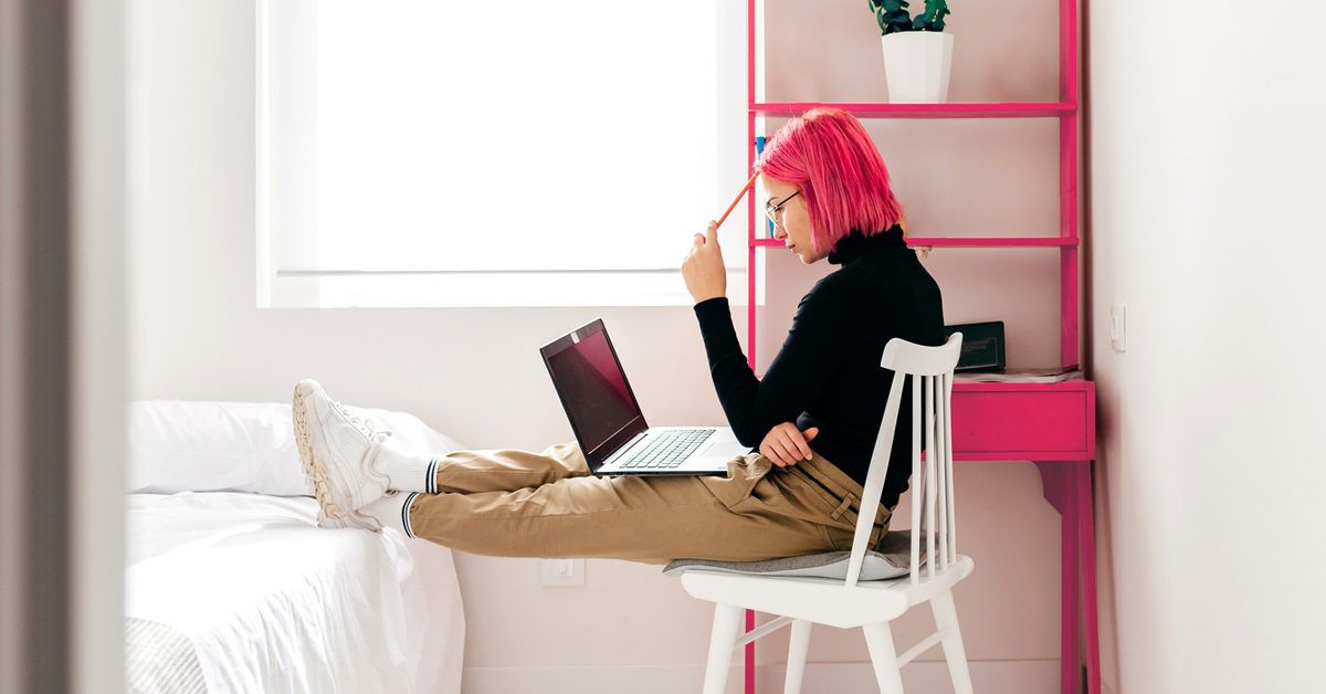 Desk in front store of bed