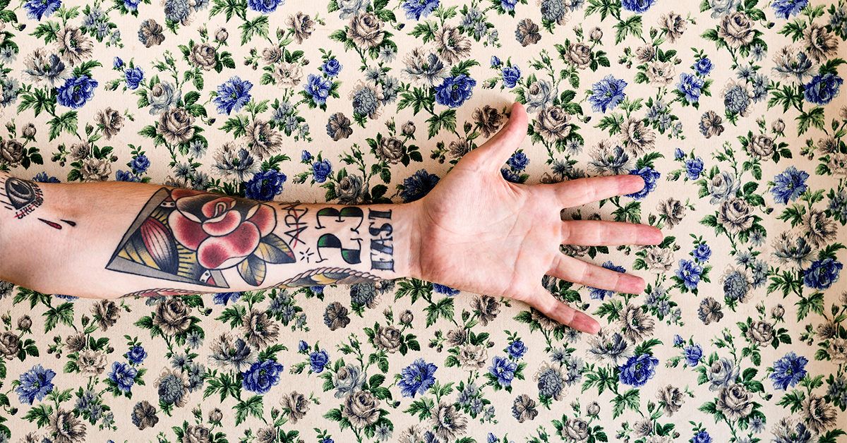 GRT male arm tattoo floral wallpaper 1200x628 facebook