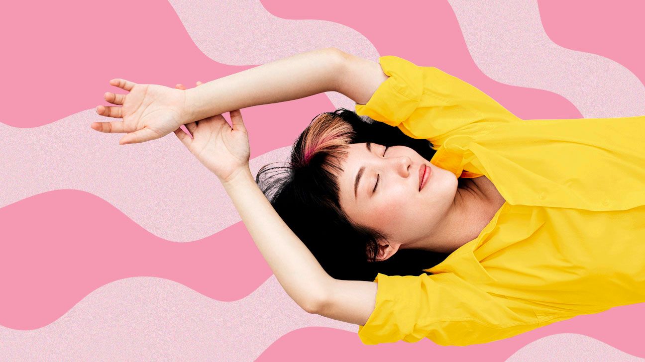 Girl sleeping on a pink illustrated background