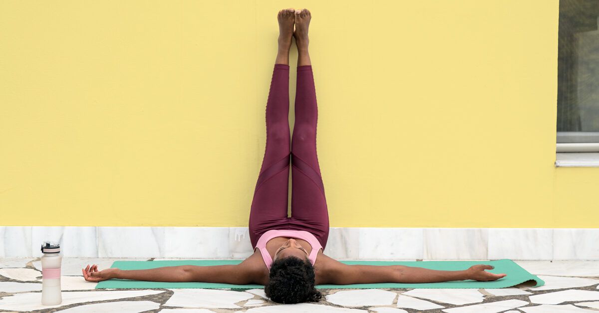 10 Yoga Poses For A Cold That'll Nurse Your Body Back To Health
