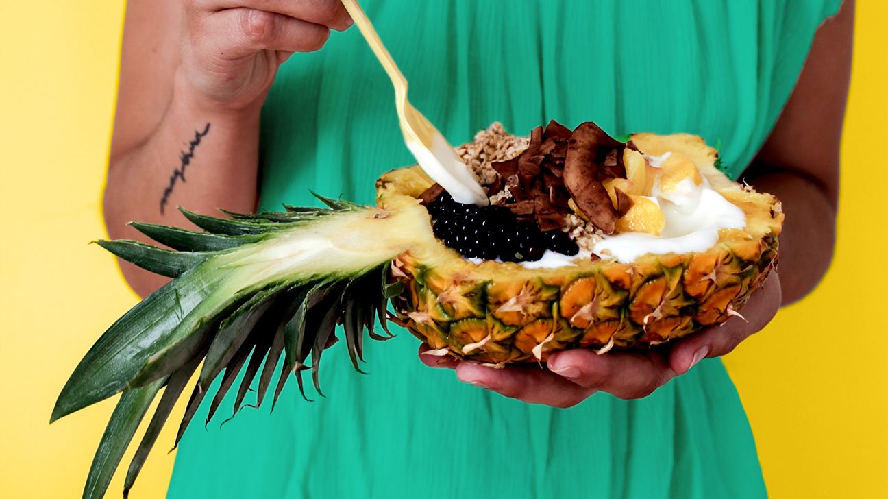 A fruity dessert in a pineapple header