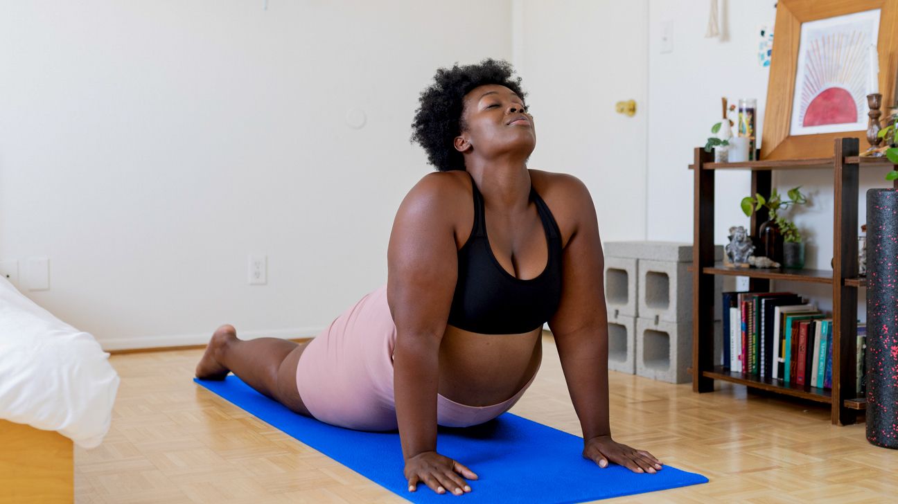 woman meditating in lotus pose at yoga s... | Stock Video | Pond5