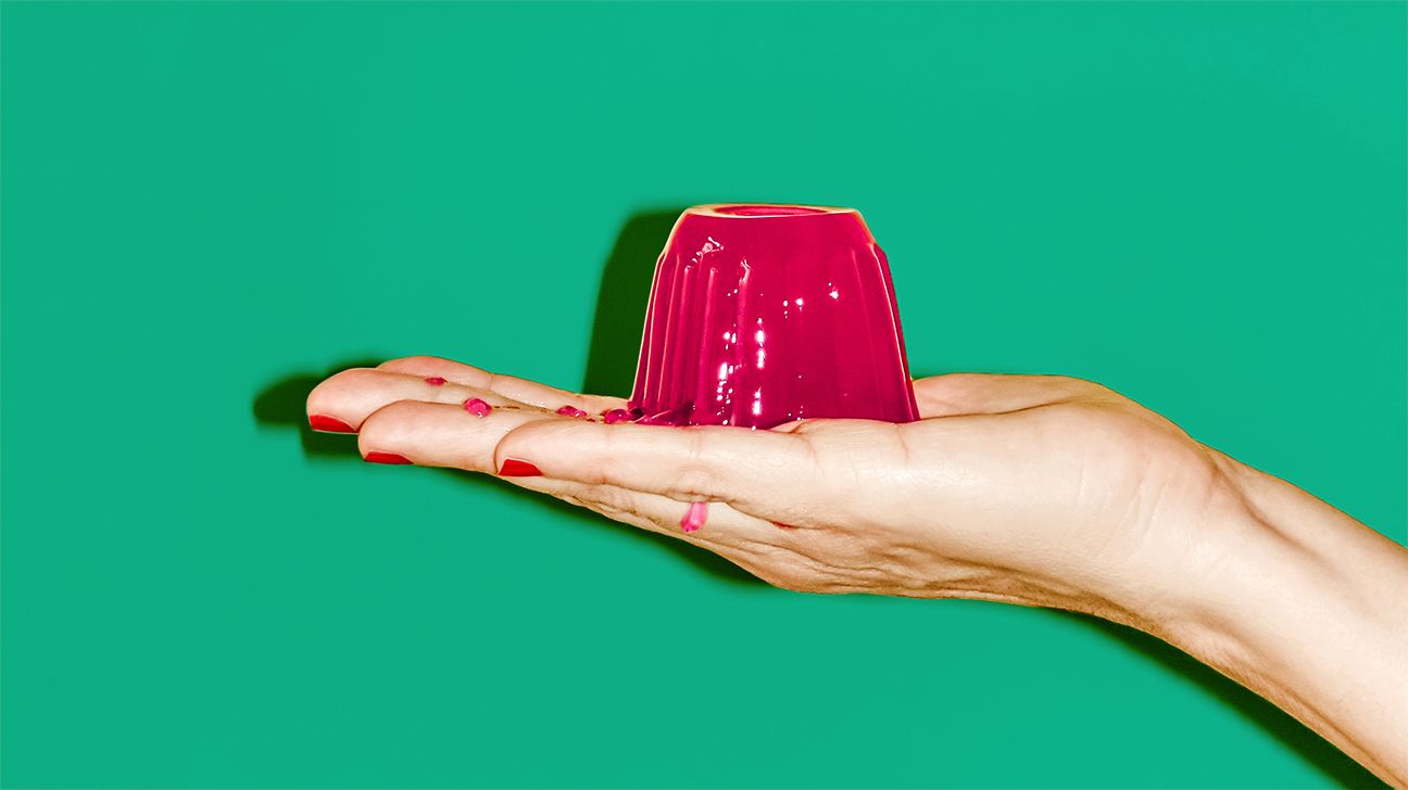 Female hand holding a blob of jello