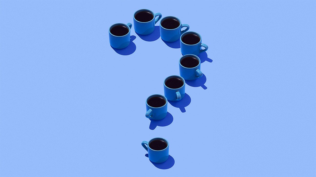 Coffee cups in question mark formation on blue background how much caffeine header
