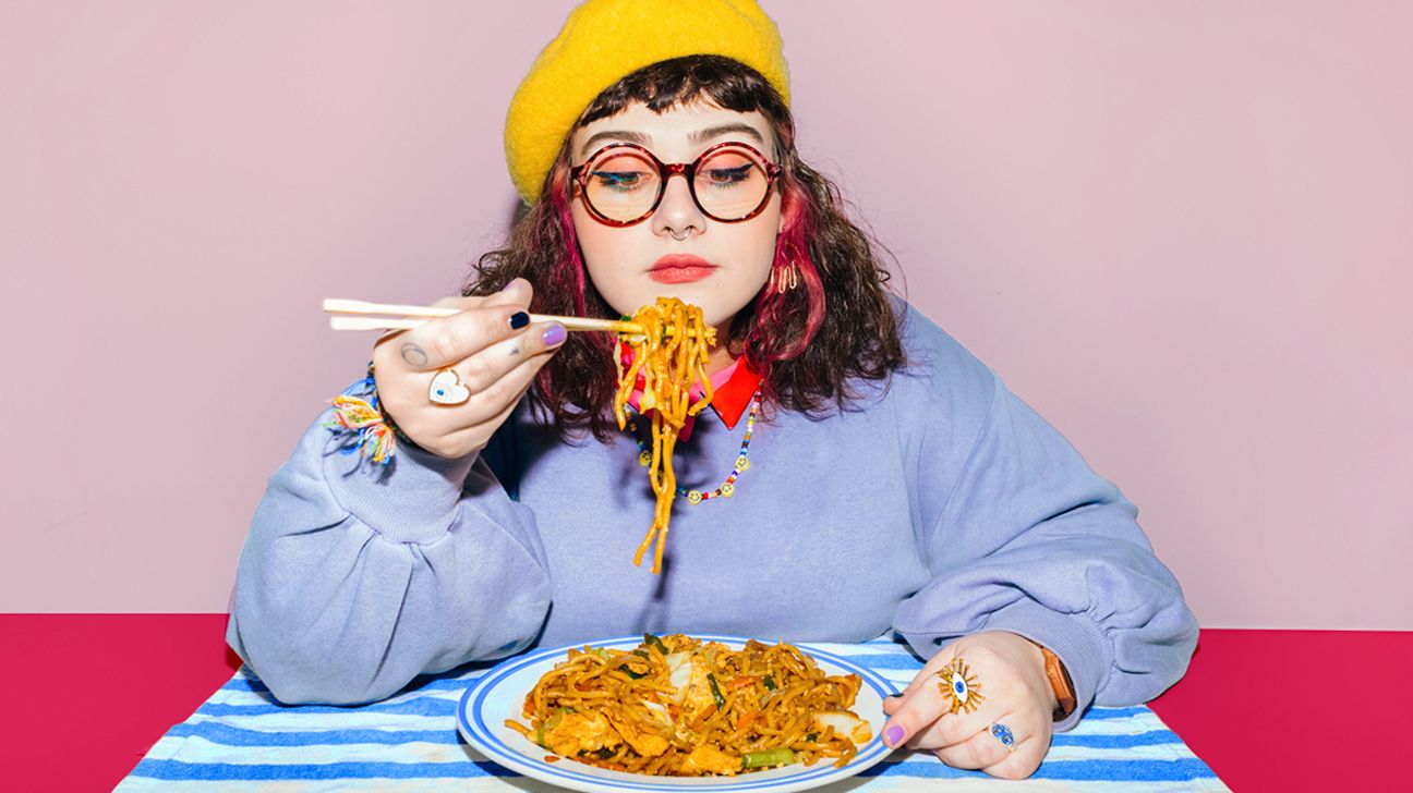 woman practices mindful eating on a meal header