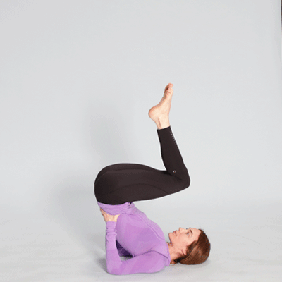 Shoulderstand modifications and variations with a bolster - Body