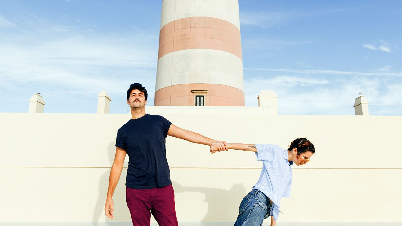 Couple pushes each other away header