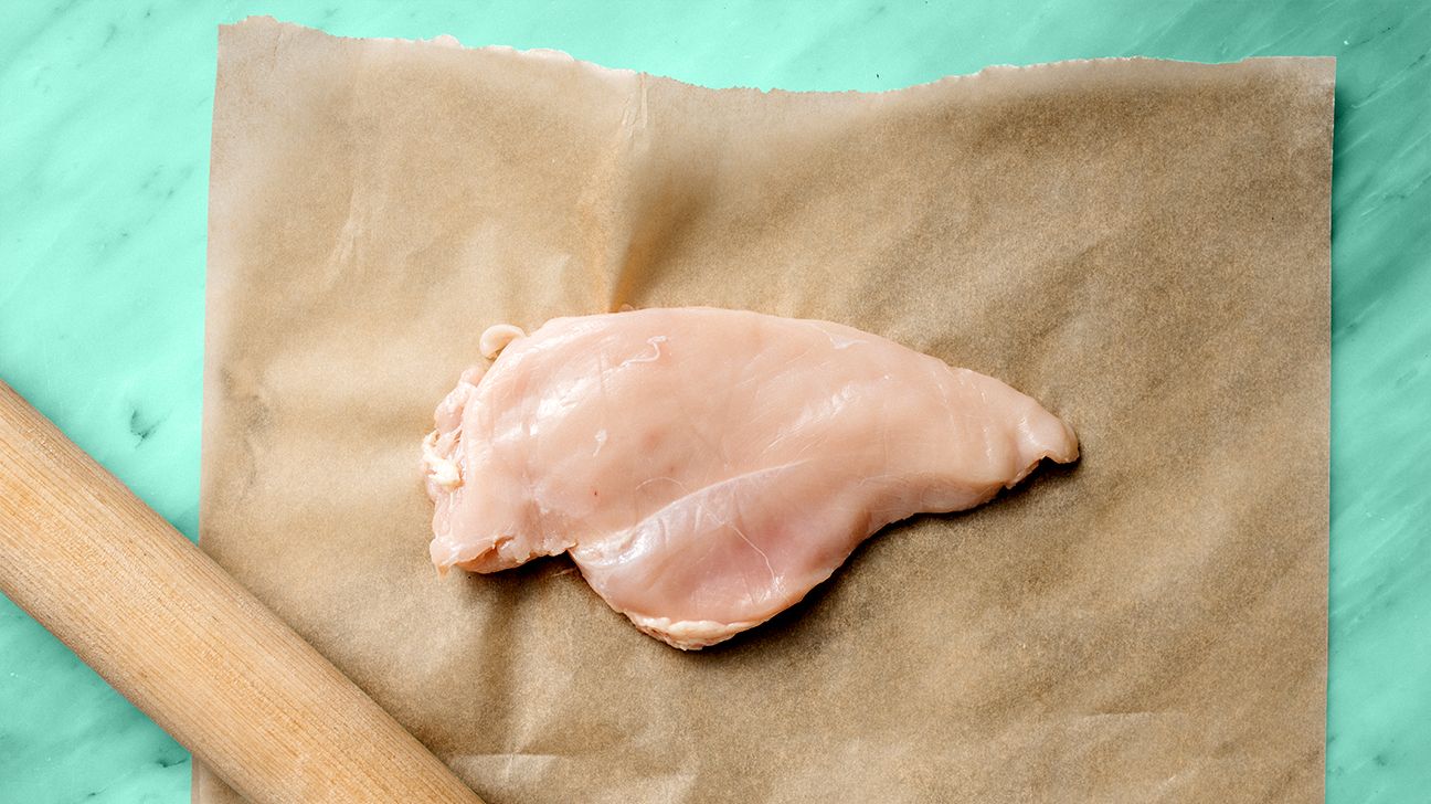 Here's Why You Should Have A Separate Cutting Board For Raw Chicken