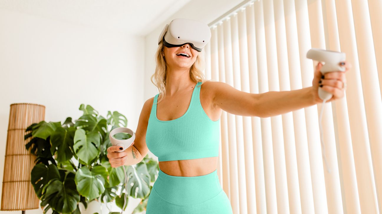 woman playing a vr fitness game