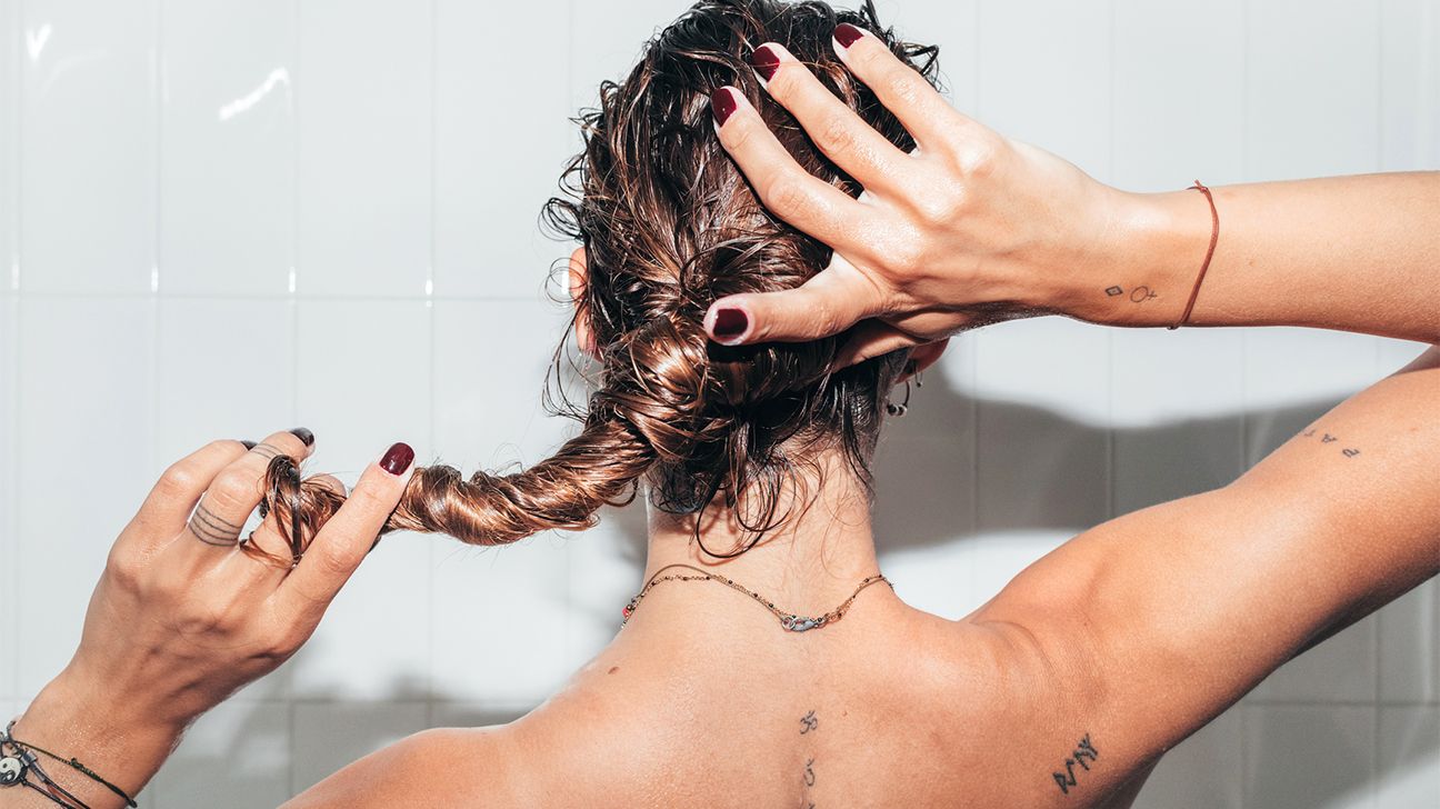 woman washing hair header